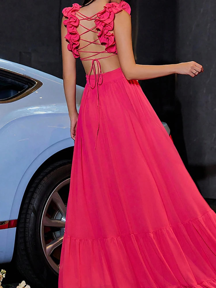 Vestido Longo Maxi Glam Fúcsia com Recortes e Costas Trançadas