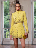 Conjunto Crystal Glow Amarelo 2 Peças – Top Cropped Gola Alta e Minissaia Cravejada