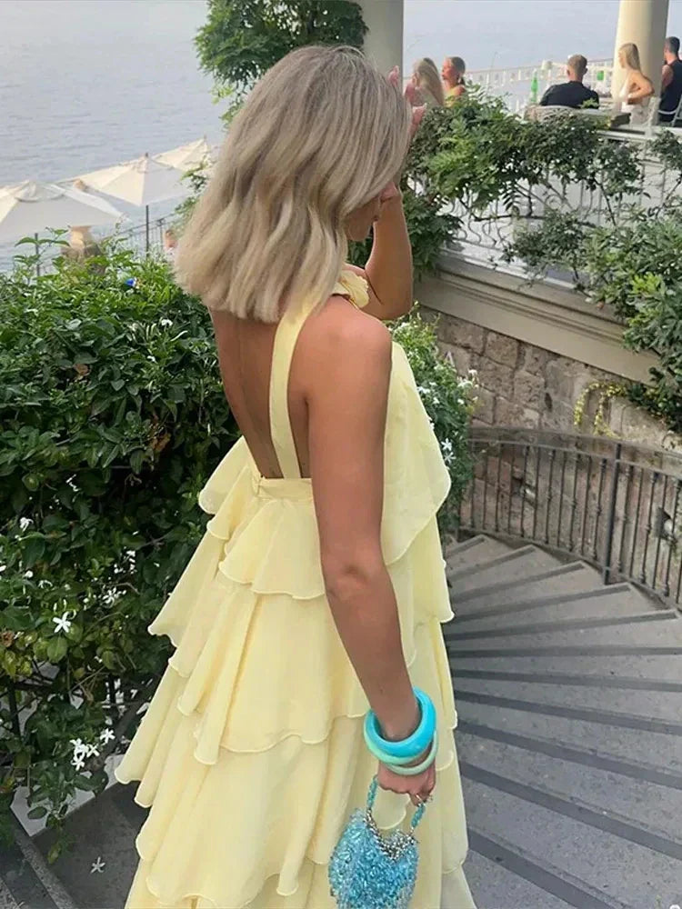 Vestido amarelo longo de verão com gola halter sexy, folhos e costas abertas para festa na praia