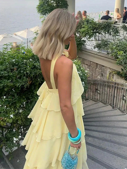 Vestido amarelo longo de verão com gola halter sexy, folhos e costas abertas para festa na praia