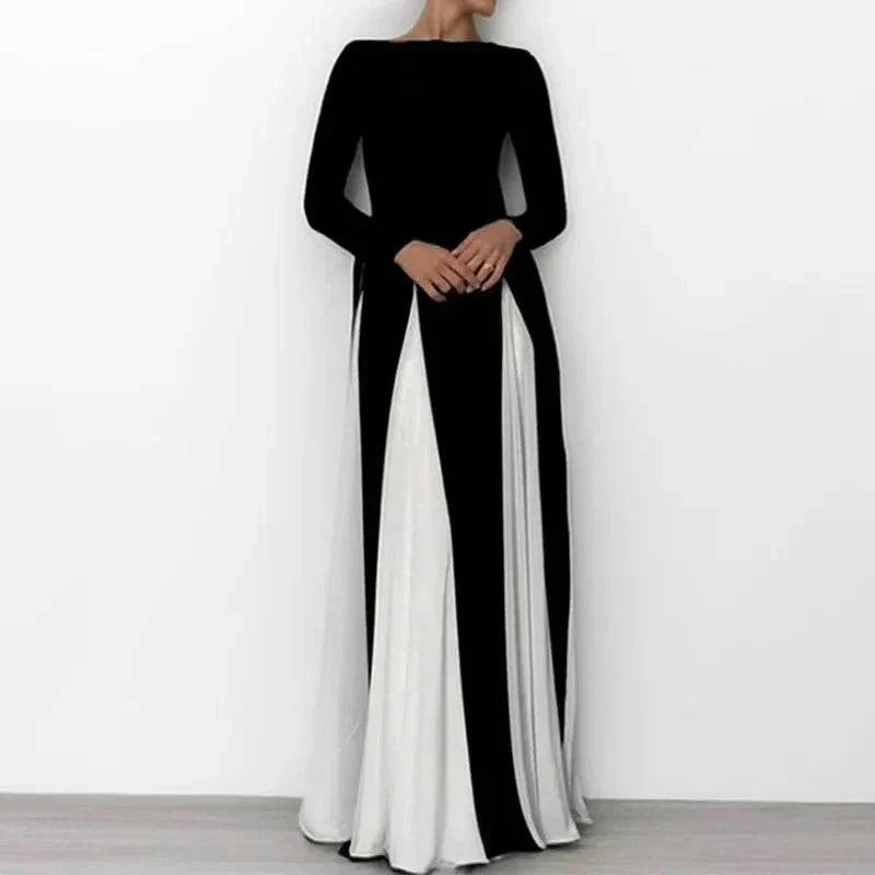 Vestido de férias bicolor preto e branco com alças finas e saia fluida elegante