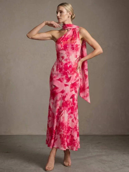 Vestido longo floral rosa com gola assimétrica e echarpe fluida para eventos elegantes