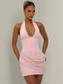 Vestido curto bodycon elegante com decote halter em V profundo, sem mangas e costas abertas