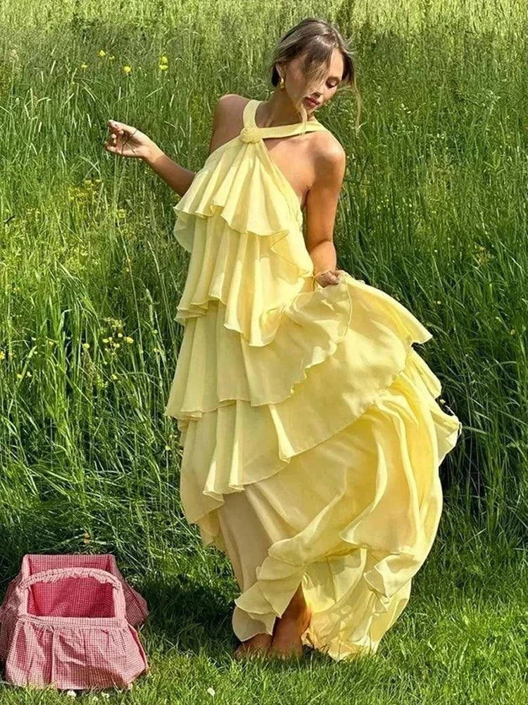 Vestido amarelo solto longo com decote halter sexy, flores e babados para verão e festas na praia