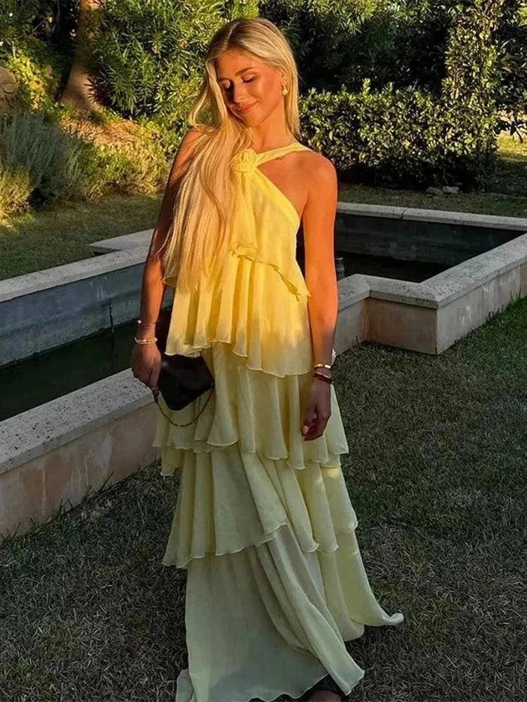 Vestido amarelo longo feminino com decote halter sexy e folhos florais, ideal para praia e festa de verão