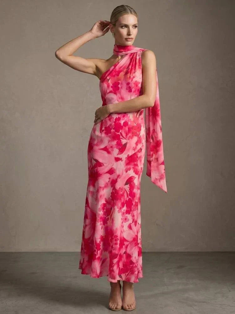 Vestido longo floral rosa com decote assimétrico e echarpe fluida para eventos elegantes